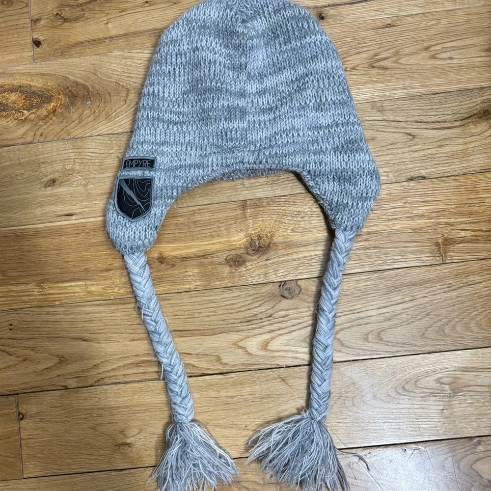 EMPYRE Gray Knit Hat with Braided Tassels